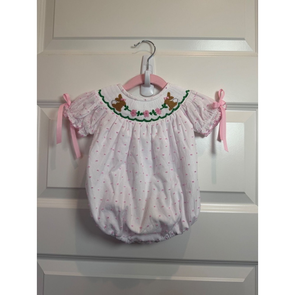 8.The Smocked Flamingo Newborn Pink Swiss Dot Bunny Smocked Bubble Romper Easter